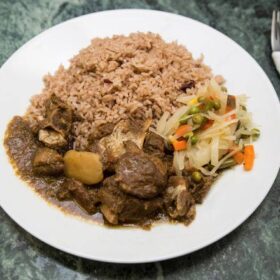 Curry Goat Served with Plain Rice